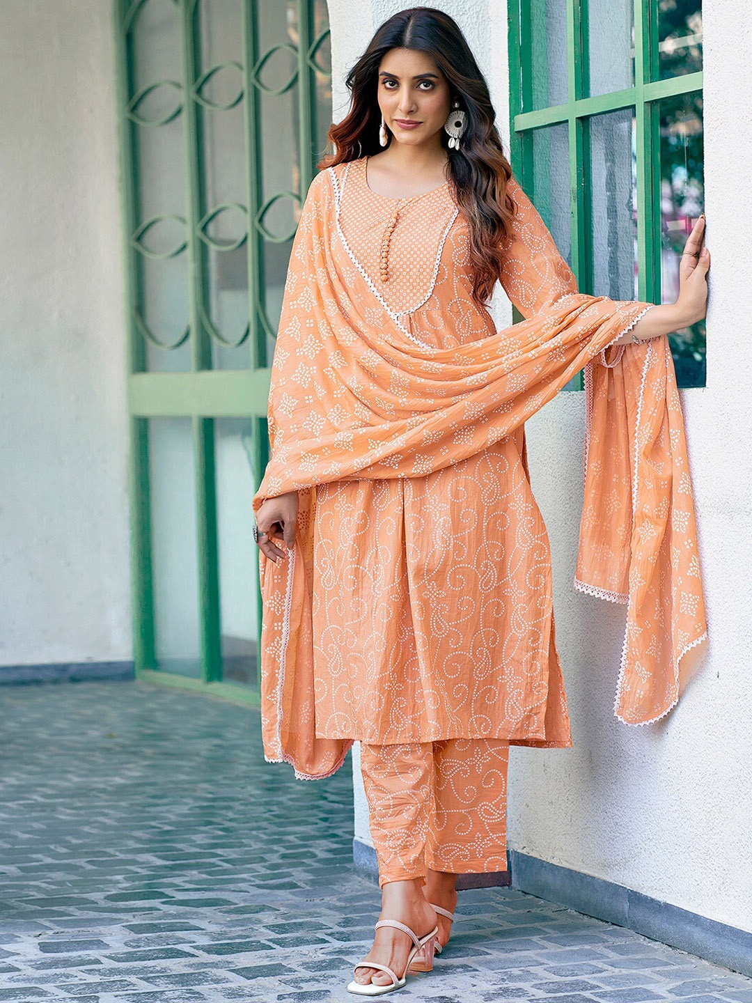 

SKYLEE Orange Floral Printed Regular Kurta with Trousers & With Dupatta