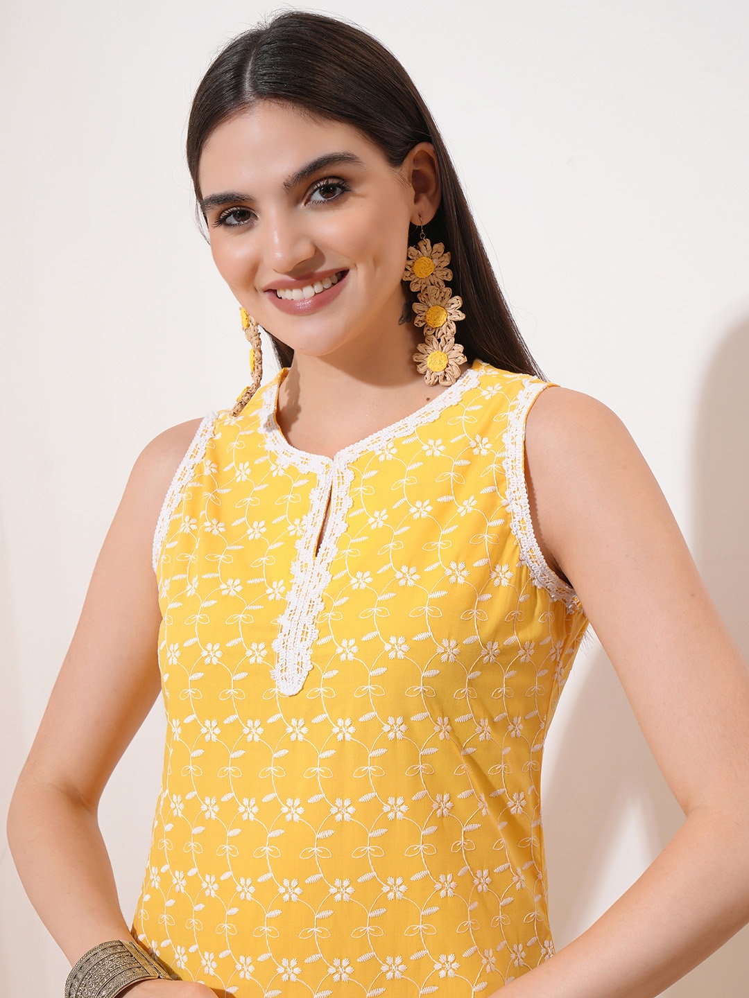 

Vishudh Yellow Ethnic Motifs Embroidered Thread Work Straight Kurta