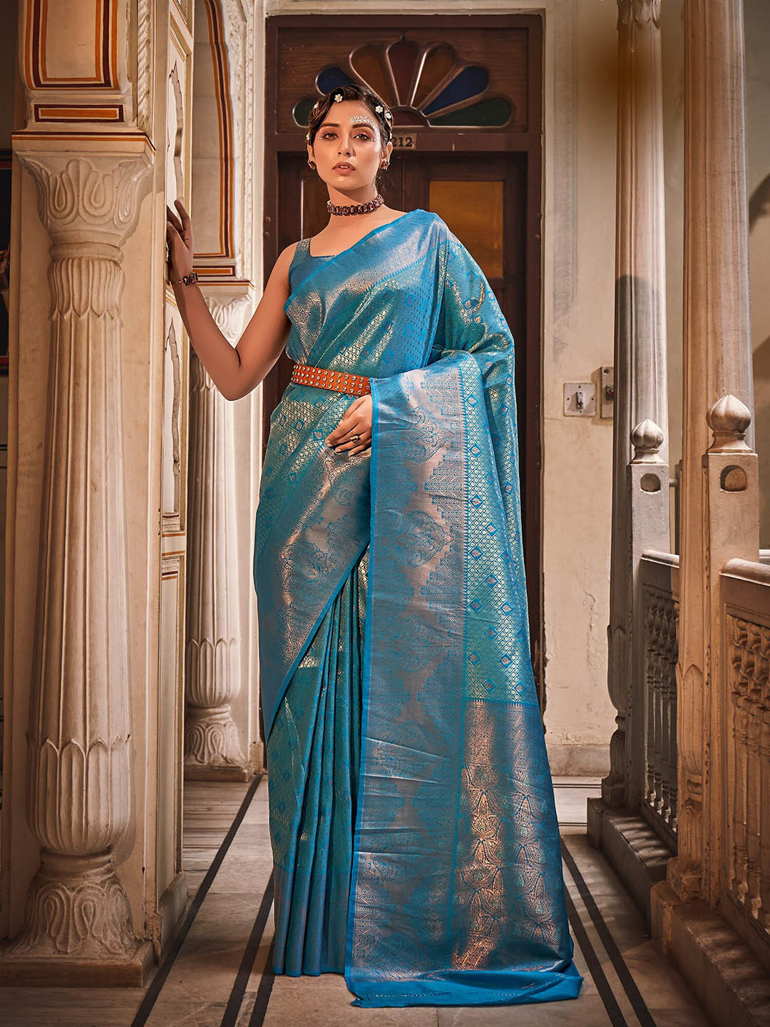 

elora Woven Design Zari Silk Blend Saree, Turquoise blue