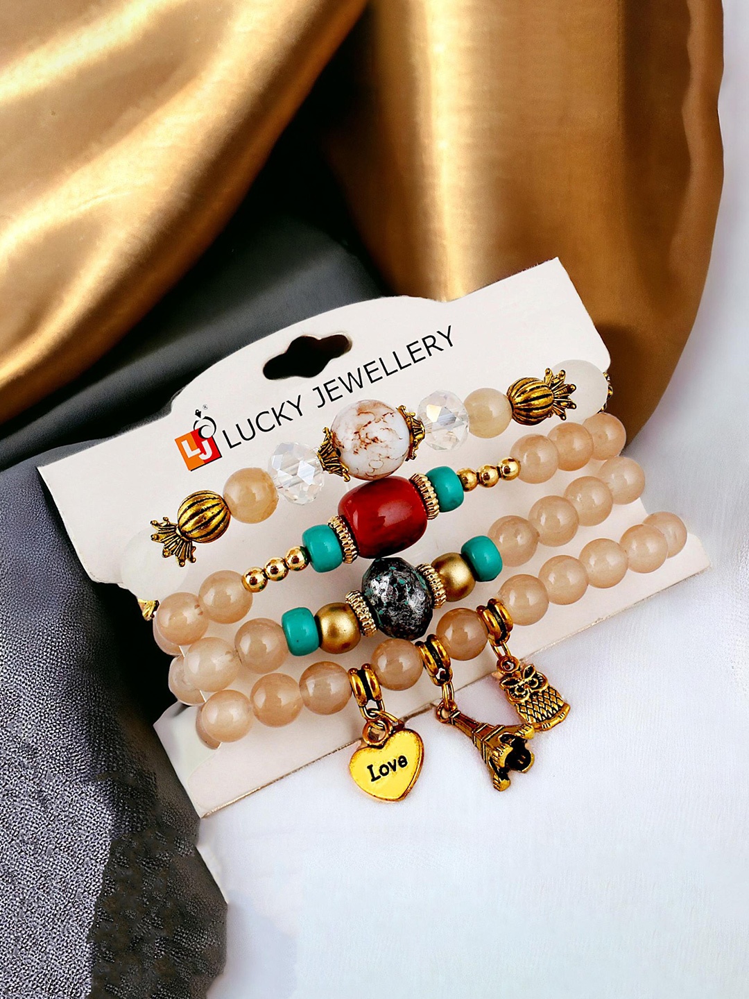 

LUCKY JEWELLERY Women Set Of 4 Gold-Plated Artificial Beads Beaded Bracelet