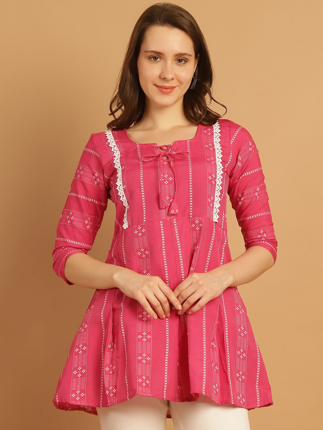 

Aarsha Ethnic Motifs Printed Tie Up Neck Three-Quarter Sleeves Pure Cotton Short Kurti, Pink