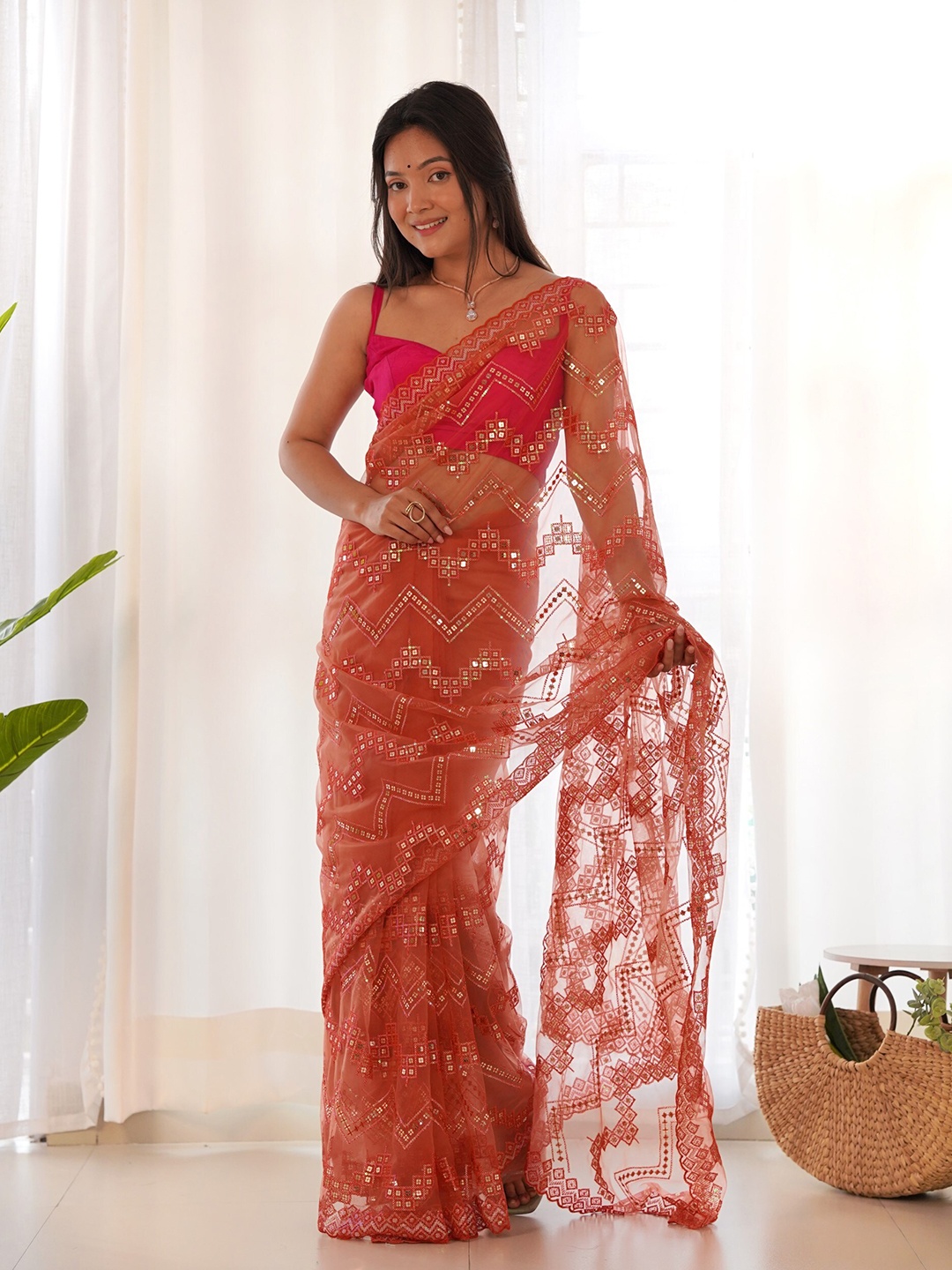 

RV CREATION Sequinned Net Saree, Orange