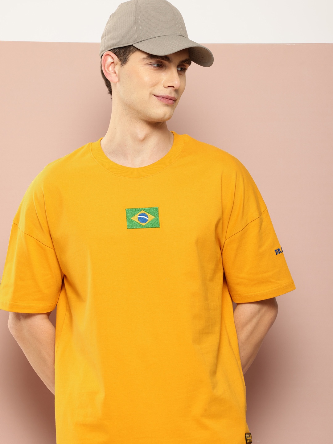 

Stormborn Drop-Shoulder Sleeves Oversized Pure Cotton Applique T-shirt, Mustard