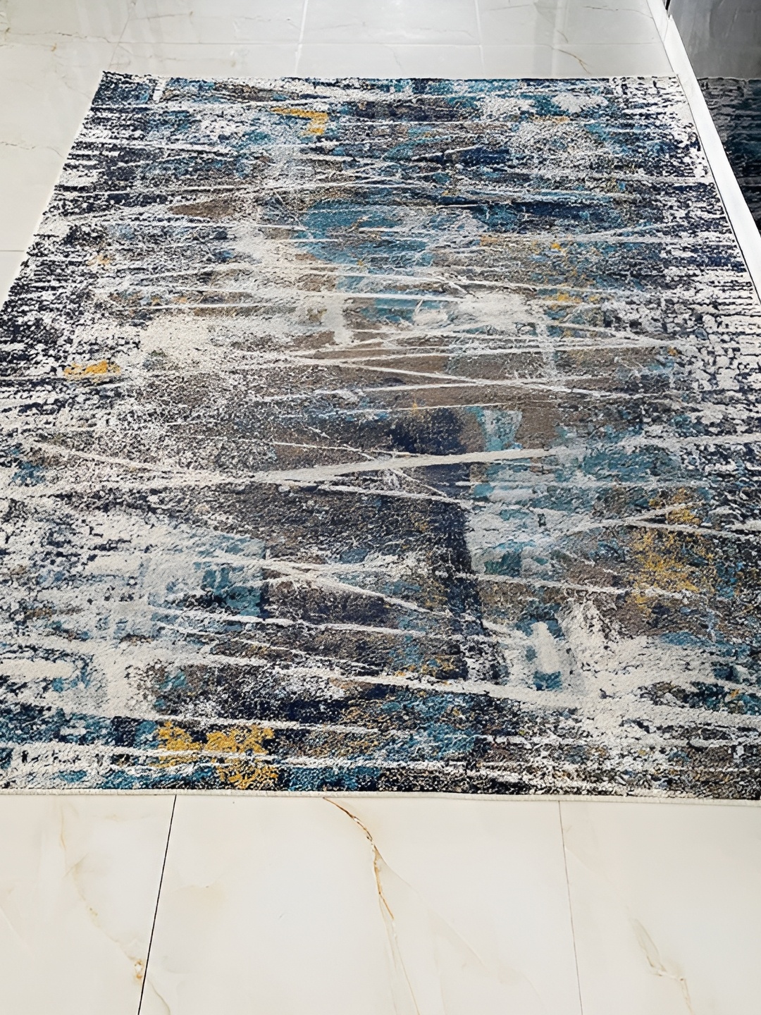 

Safiya Carpet Beige & Grey Abstract Water Resistant Carpets