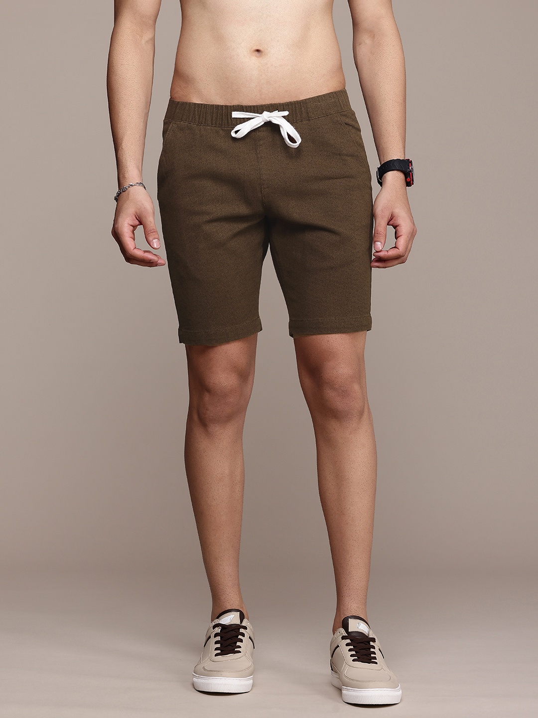 

Roadster Men Solid Mid-Rise Shorts, Brown