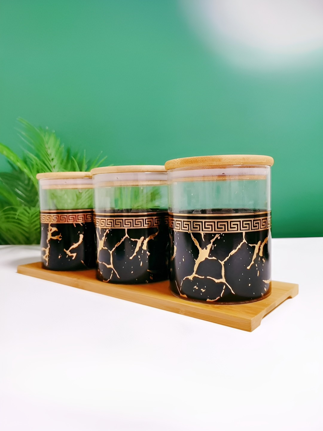 

USHA SHRIRAM 3 Pieces Black & Gold Borosilicate Jars with Bamboo Lids & Tray