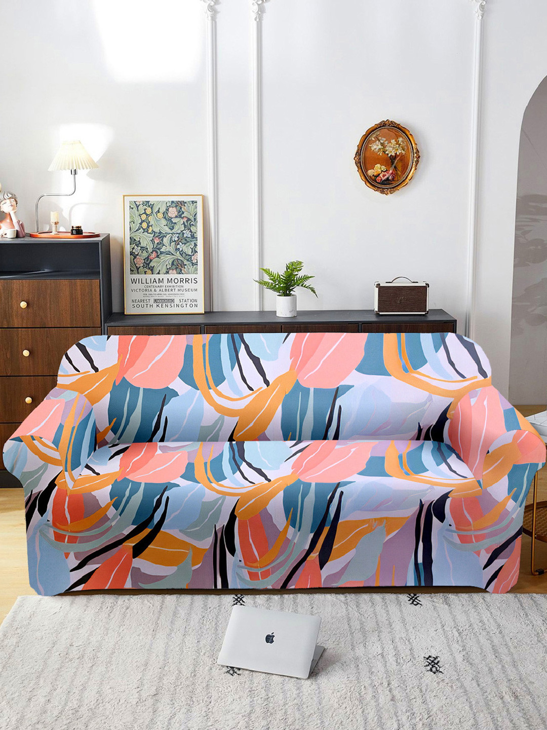 

Aura Peach & Blue Printed Three Seater Sofa Cover With Arms