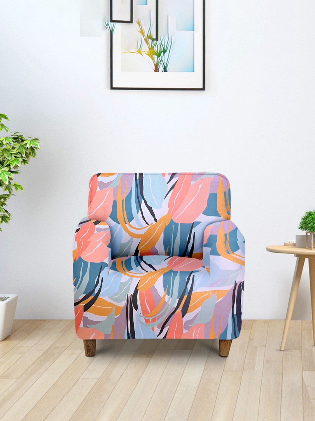 

Aura Peach & Green Printed Single Seater Sofa Cover With Arms