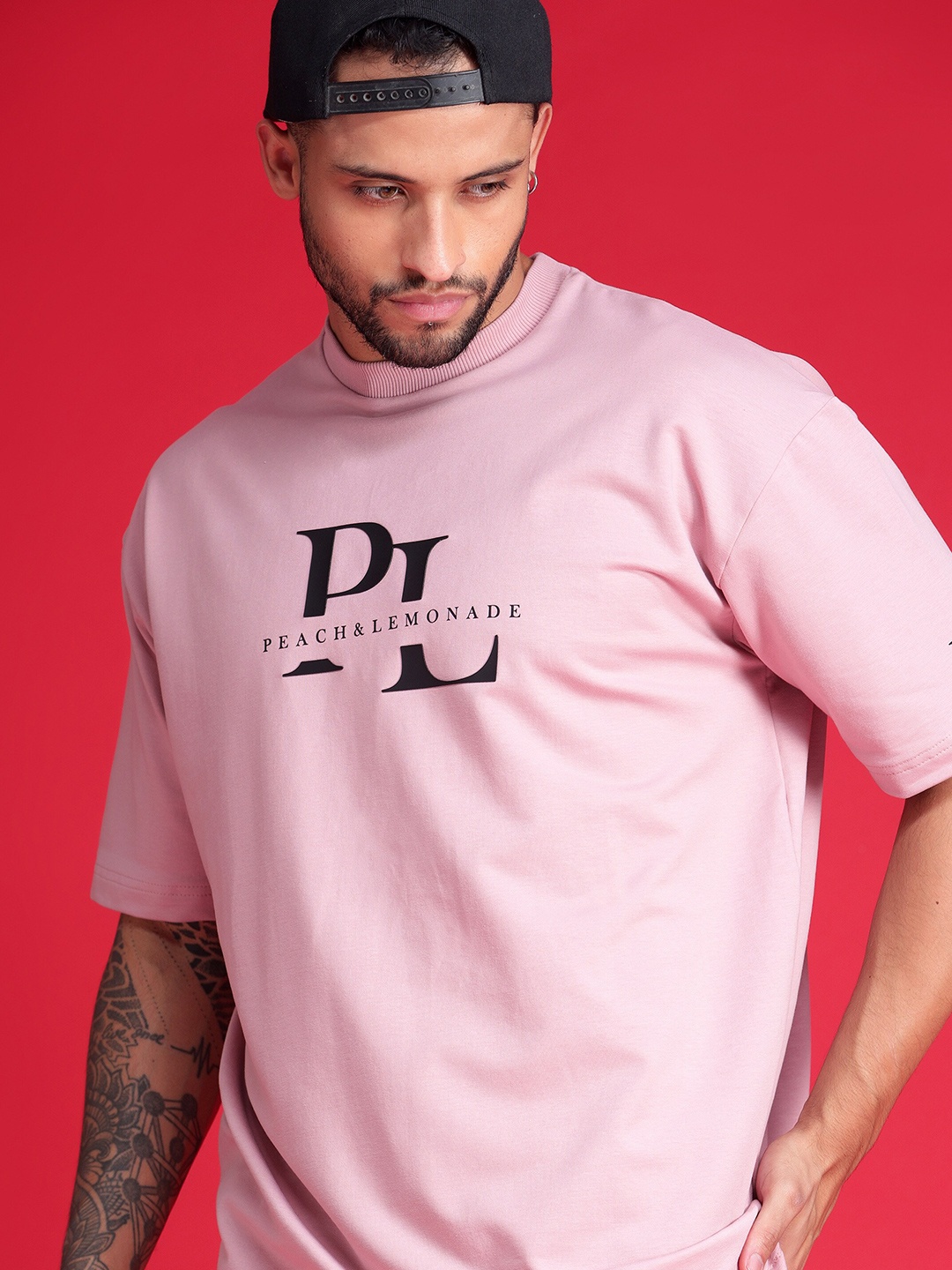 

Peach & Lemonade High Neck Drop Shoulder Sleeves Typography Printed Cotton T-shirt, Pink