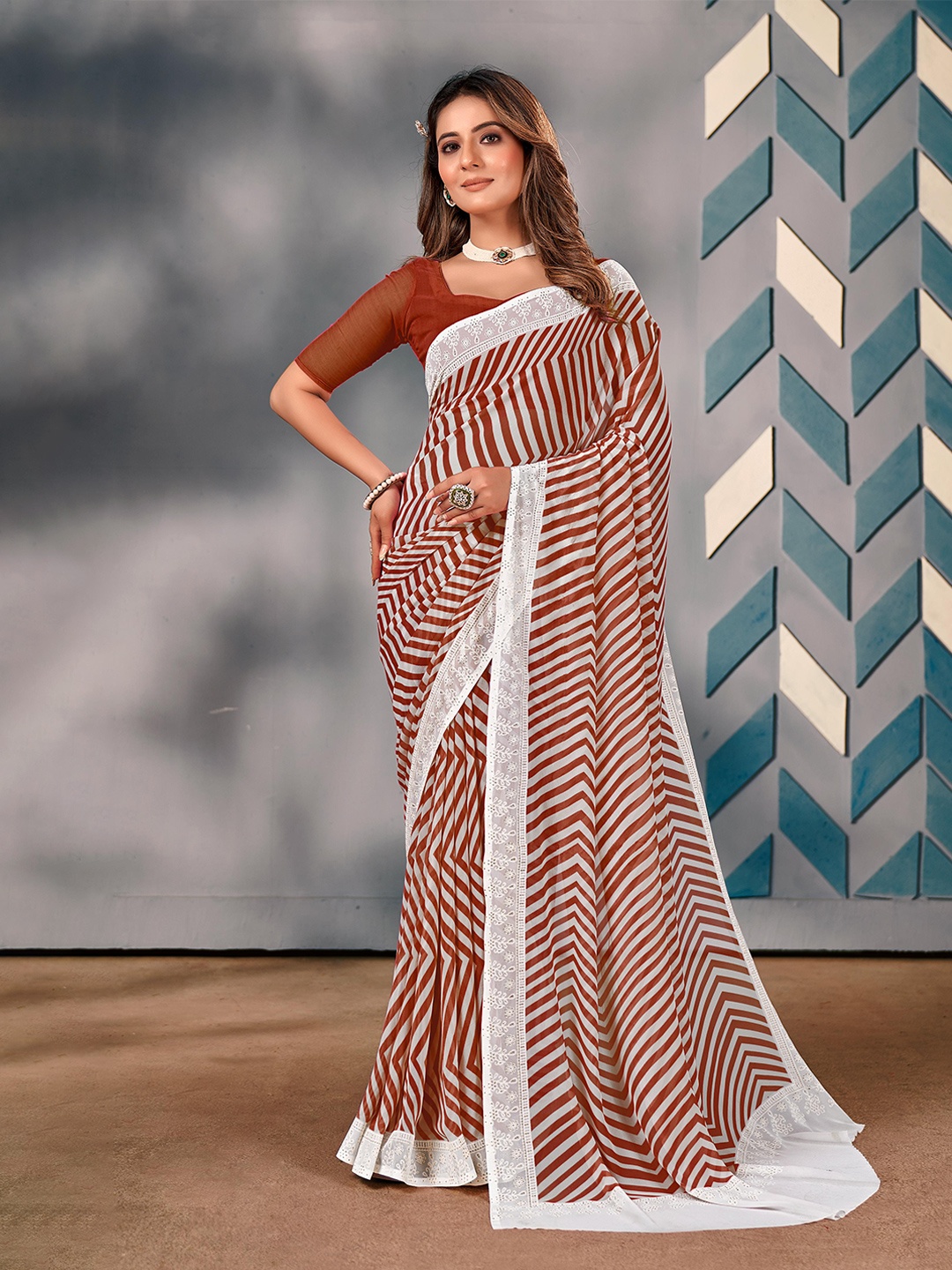 

Mitera Leheriya Embroidered Pure Georgette Saree, Brown