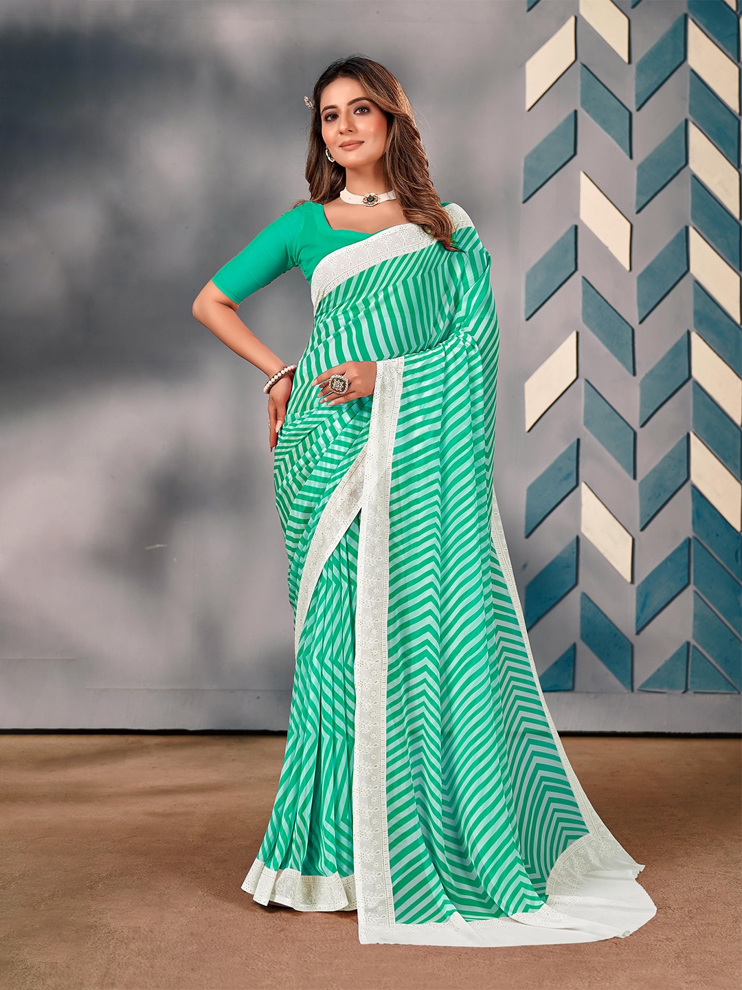 

Mitera Striped Embroidered Pure Georgette Saree, Sea green