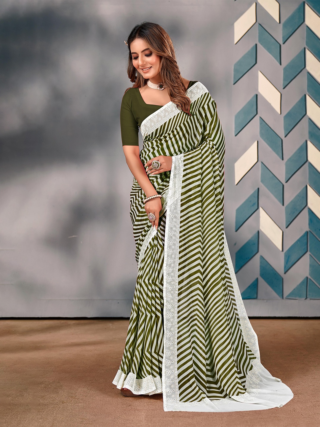 

Mitera Leheriya Embroidered Pure Georgette Saree, Green