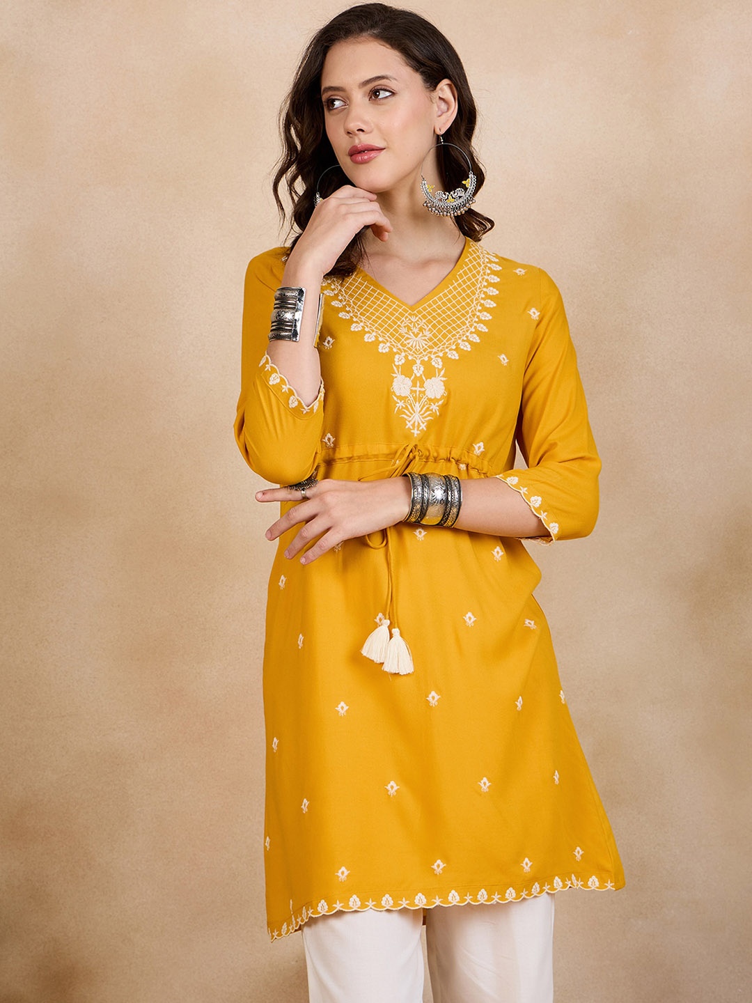 

Anouk Yellow Ethnic Motifs Embroidered Thread Work A-Line Short Kurti