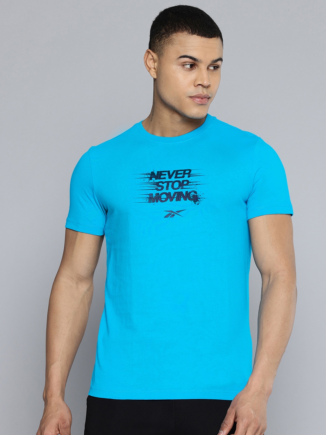 

Reebok Typography Printed Slim Fit T-shirt, Turquoise blue