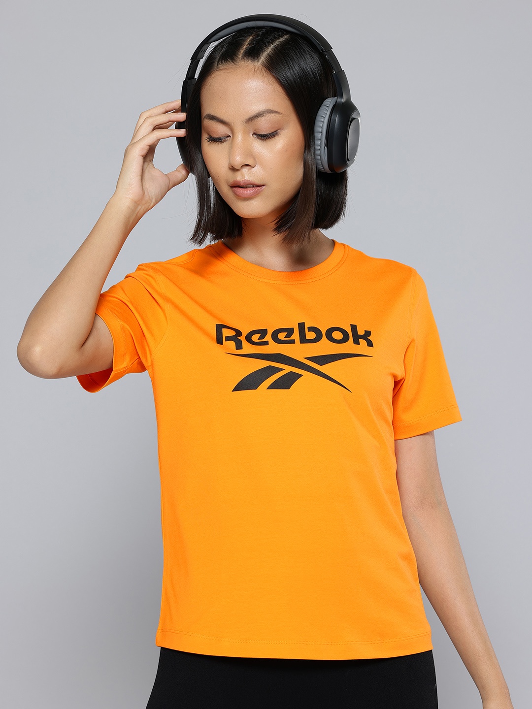 

Reebok Women Brand Logo Lifestyle T-shirt, Orange