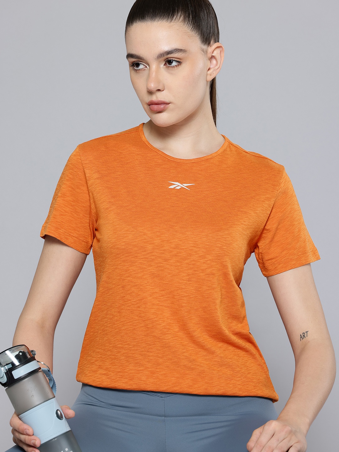 

Reebok Women Pure Cotton Grounded Training T-shirt, Orange