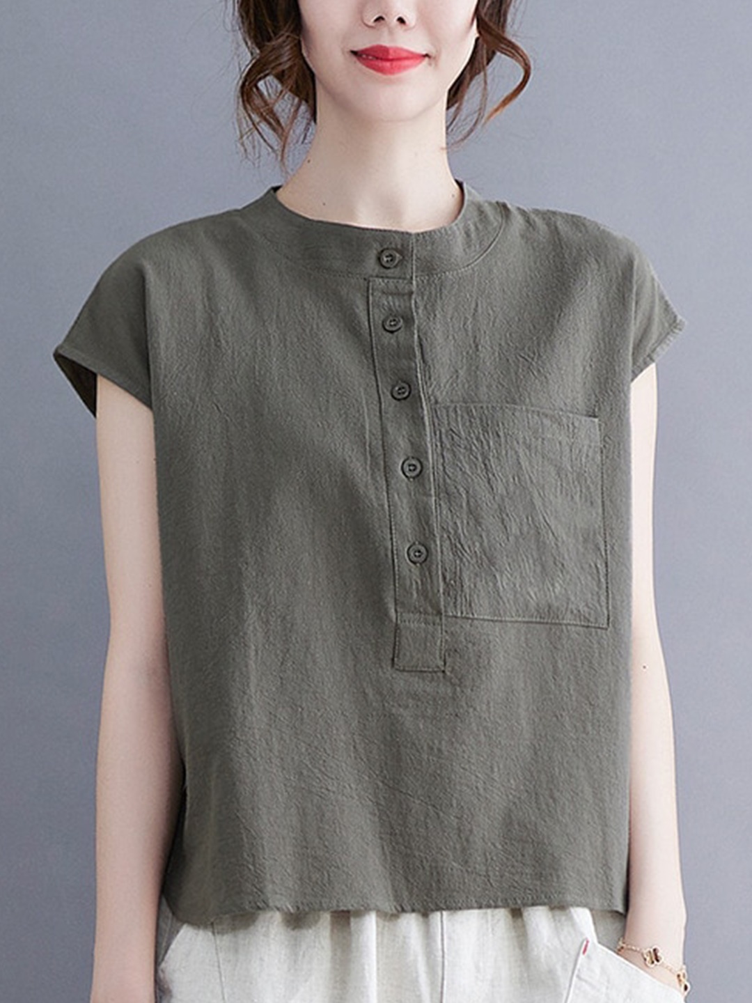 

StyleCast Green Round Neck Extended Sleeves Cotton Top