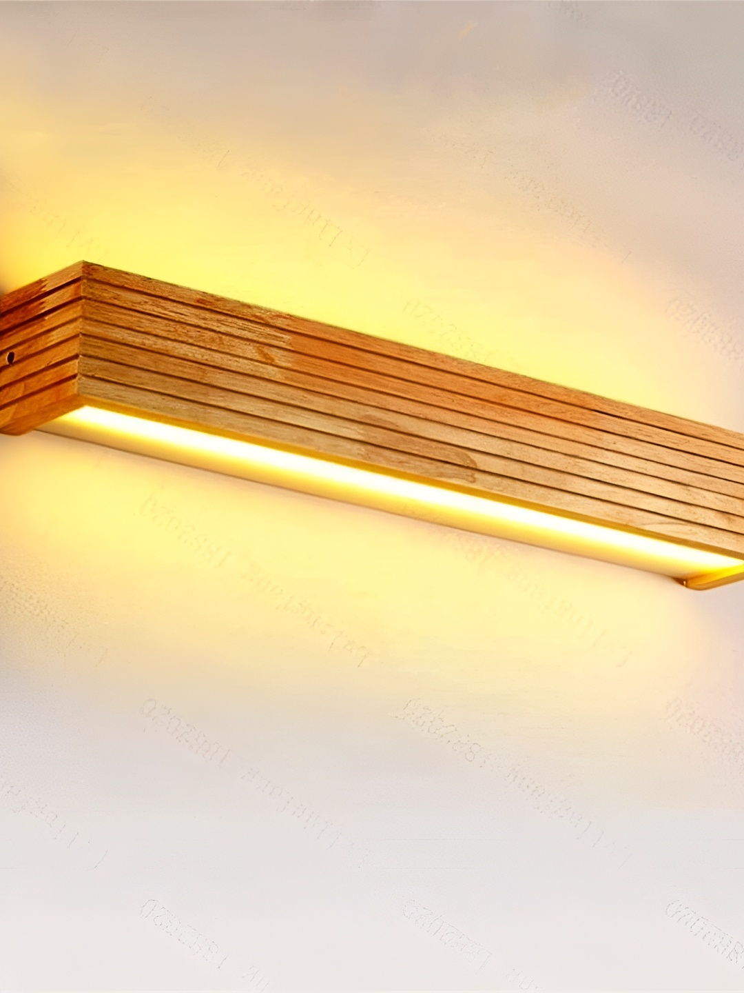 

Artica Brown Textured Wooden Rectangle Shaped Wall Lamp