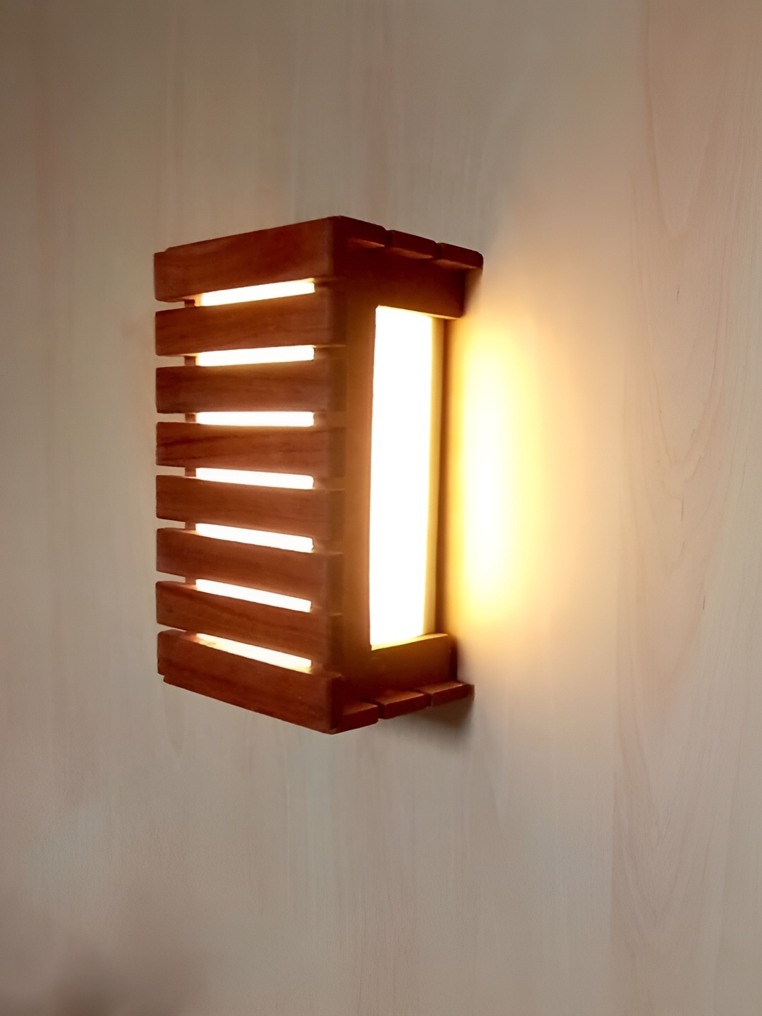 

Artica Brown Textured Wooden Rectangle Shaped Wall Lamp