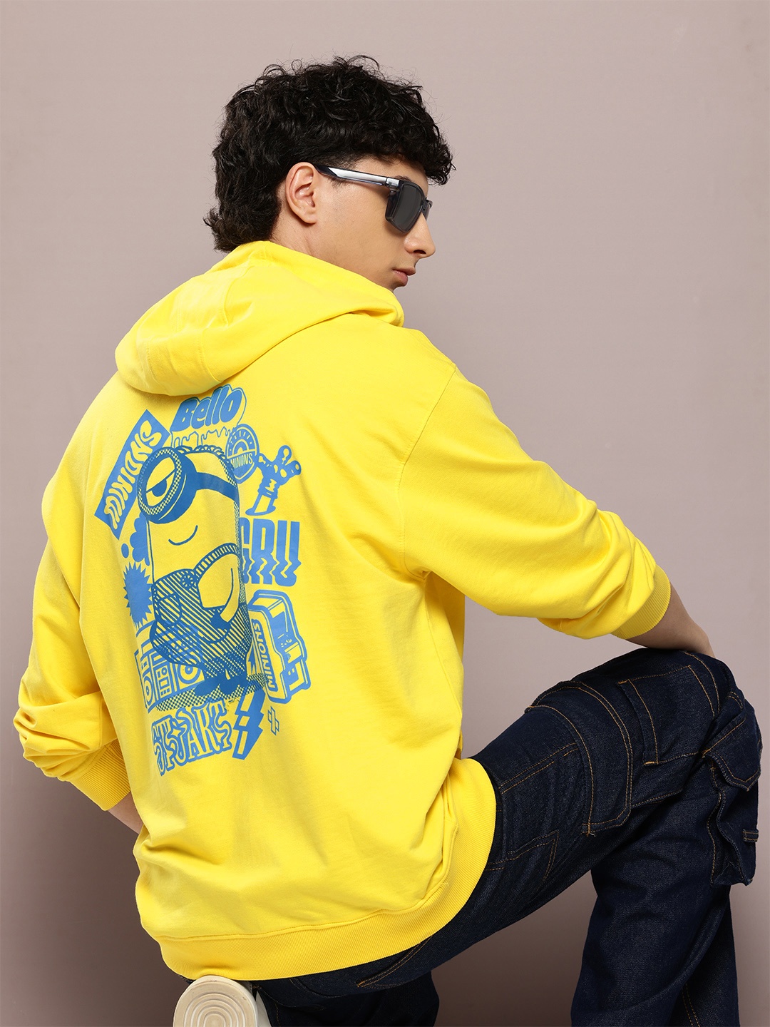 

Minions by Kook N Keech Men Printed Hooded Sweatshirt, Yellow