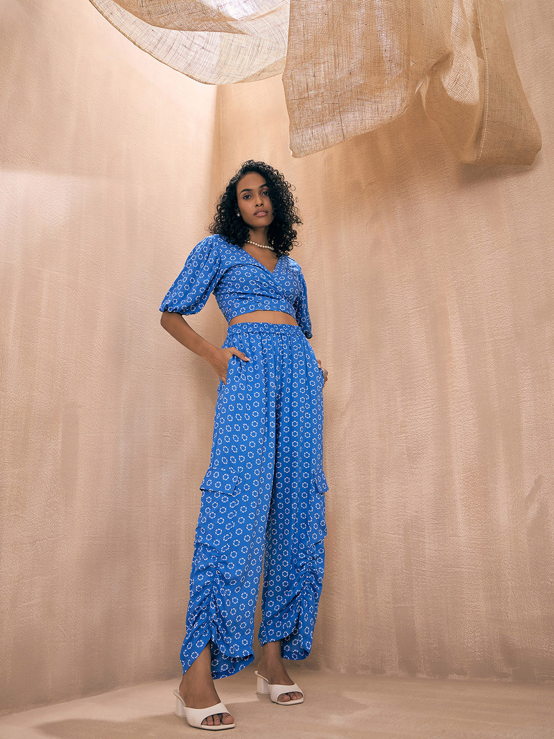 

Pink Paprika by SASSAFRAS Floral Printed Crop Top With Trousers, Blue