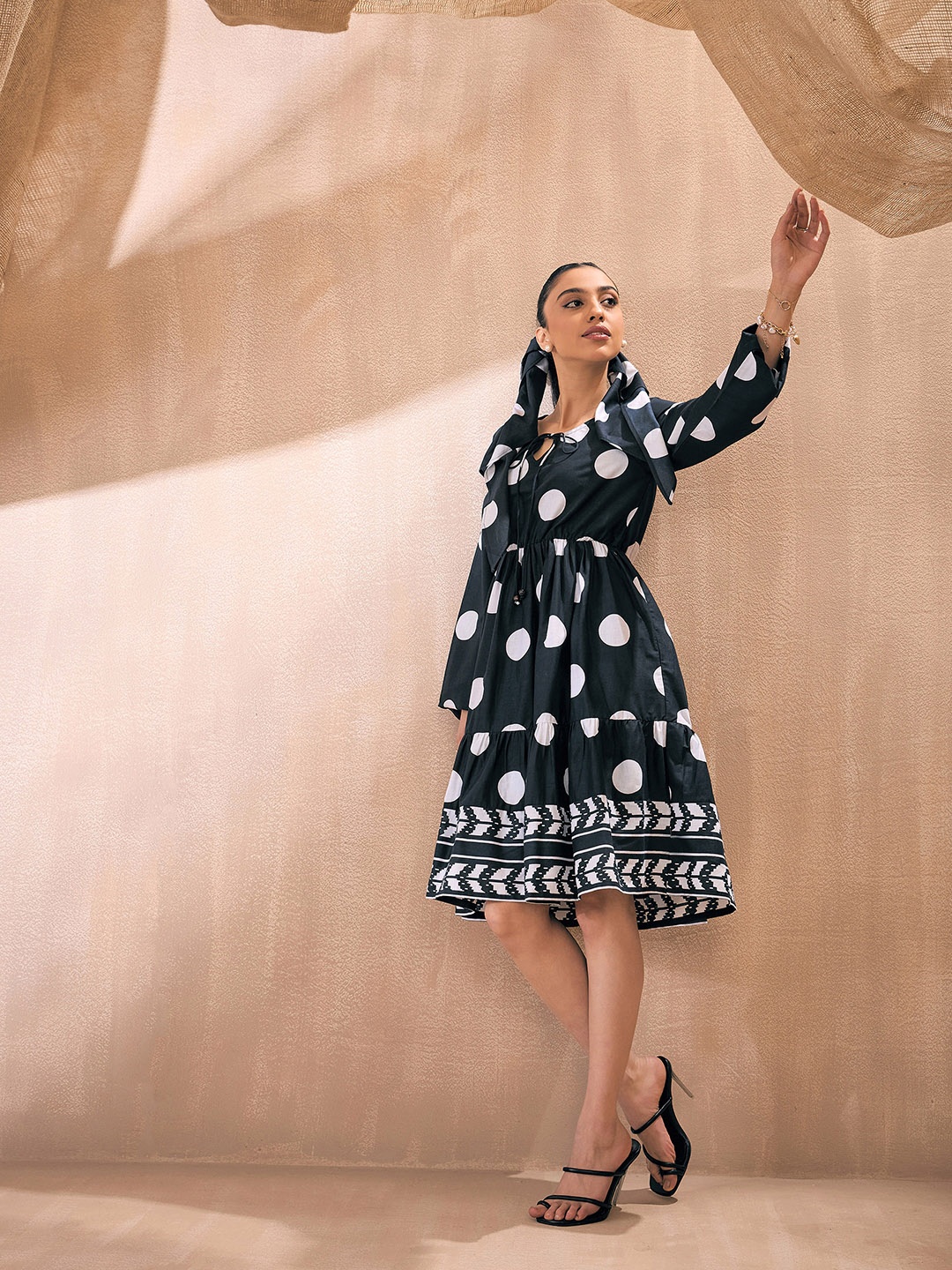

Pink Paprika by SASSAFRAS Tie Up Neck Puff Sleeves Polka Dots Print Fit & Flare Dress, Black