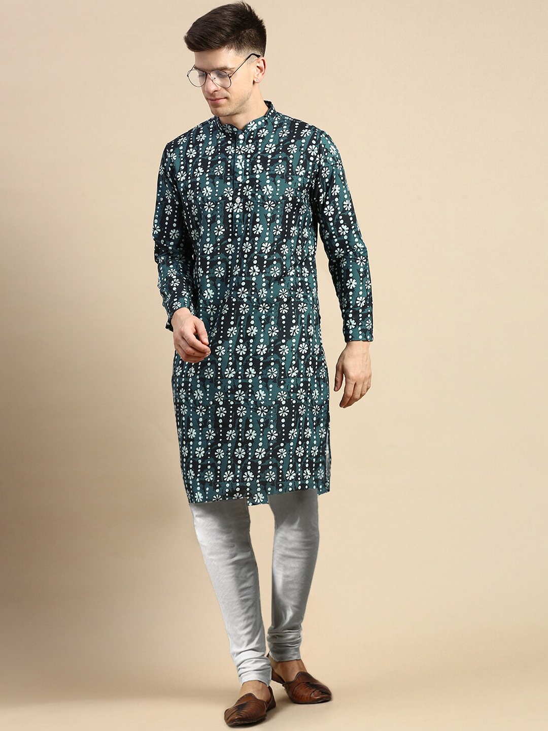 

Anouk Navy Blue Ethnic Motifs Printed Mandarin Collar Kurta With Churidar