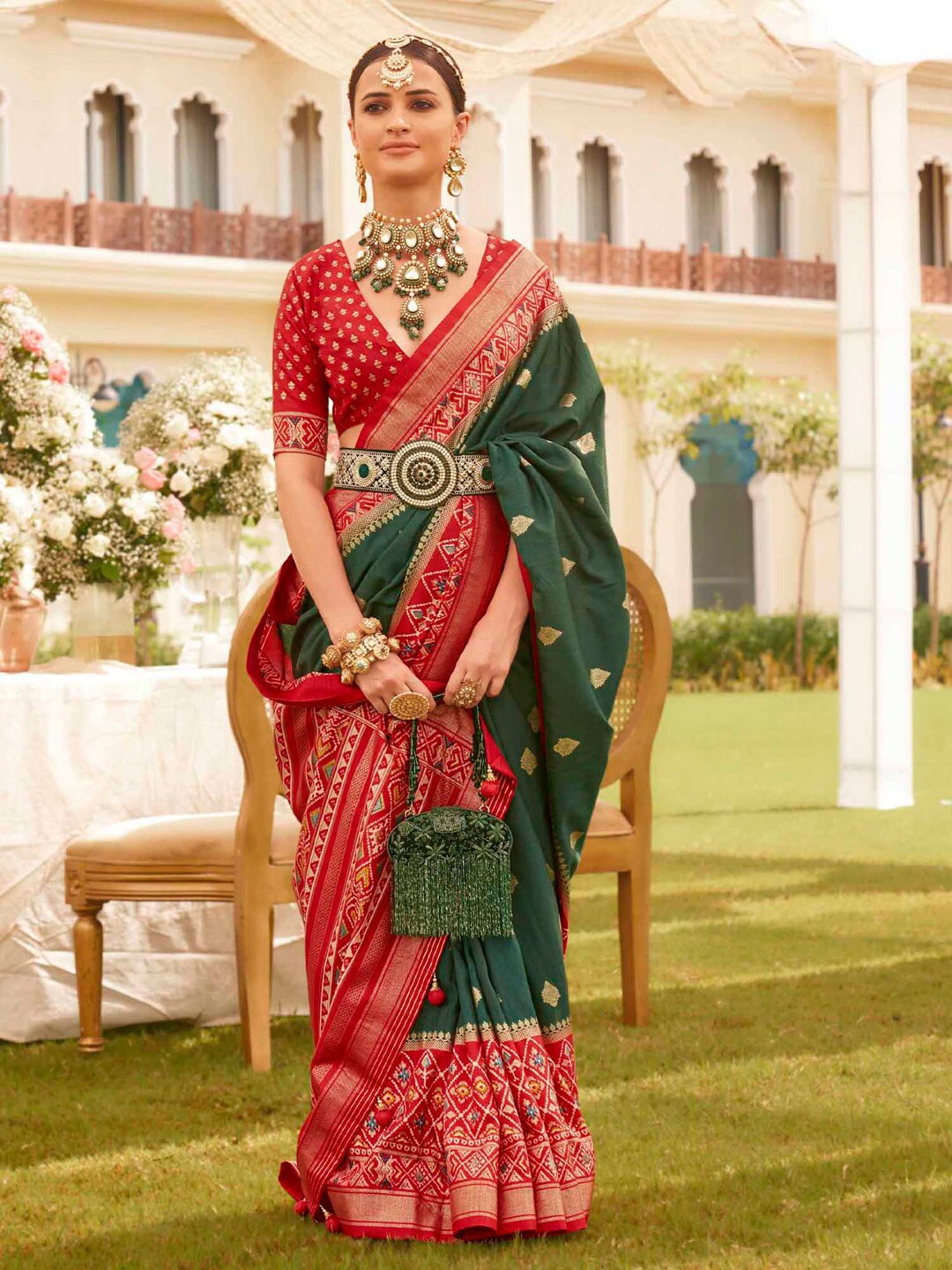 

Anouk Woven Design Zari Silk Blend Patola Saree, Green