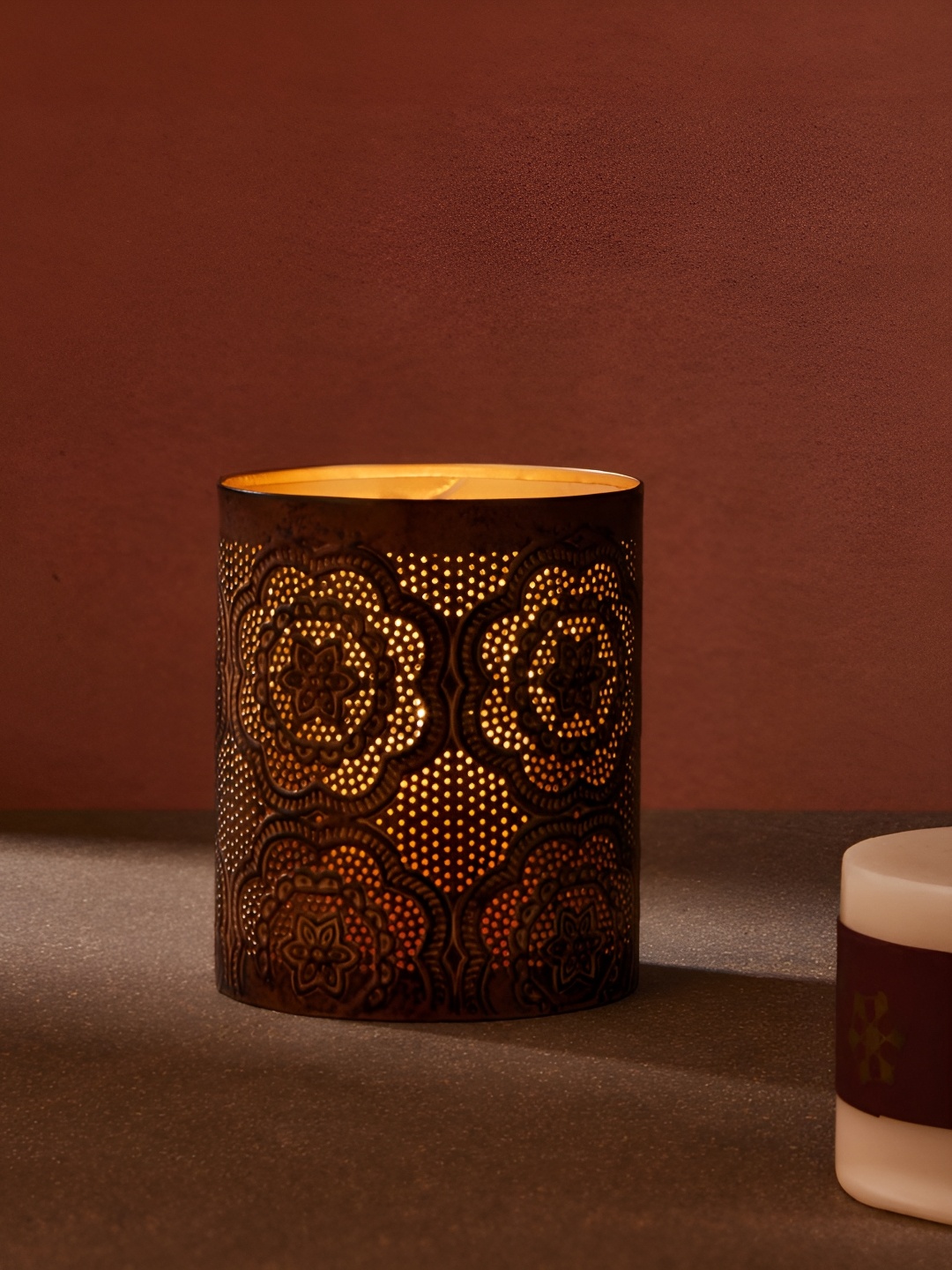 

Fabindia Brown Metal Gulmohar Cutwork Floral Votive Candle Holder