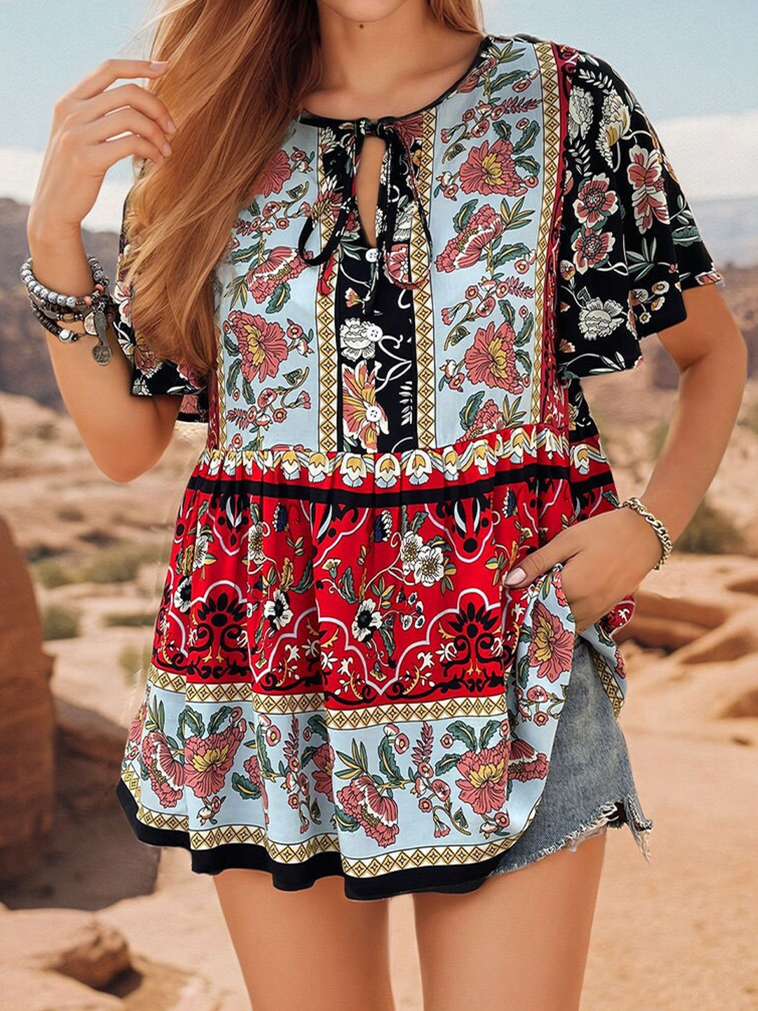 

StyleCast x Revolte Floral Printed Tie-Up Neck Flared Sleeves Gathered Peplum Top, Black
