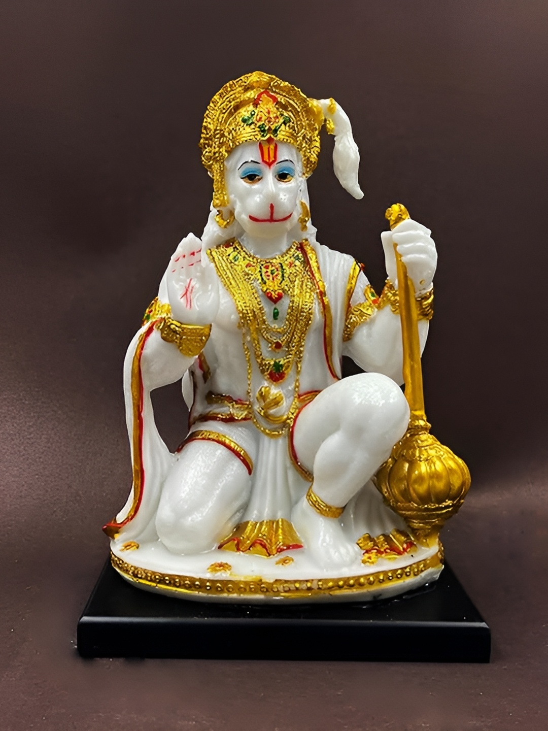 

Aura White & Gold Toned Religious Idol Showpiece