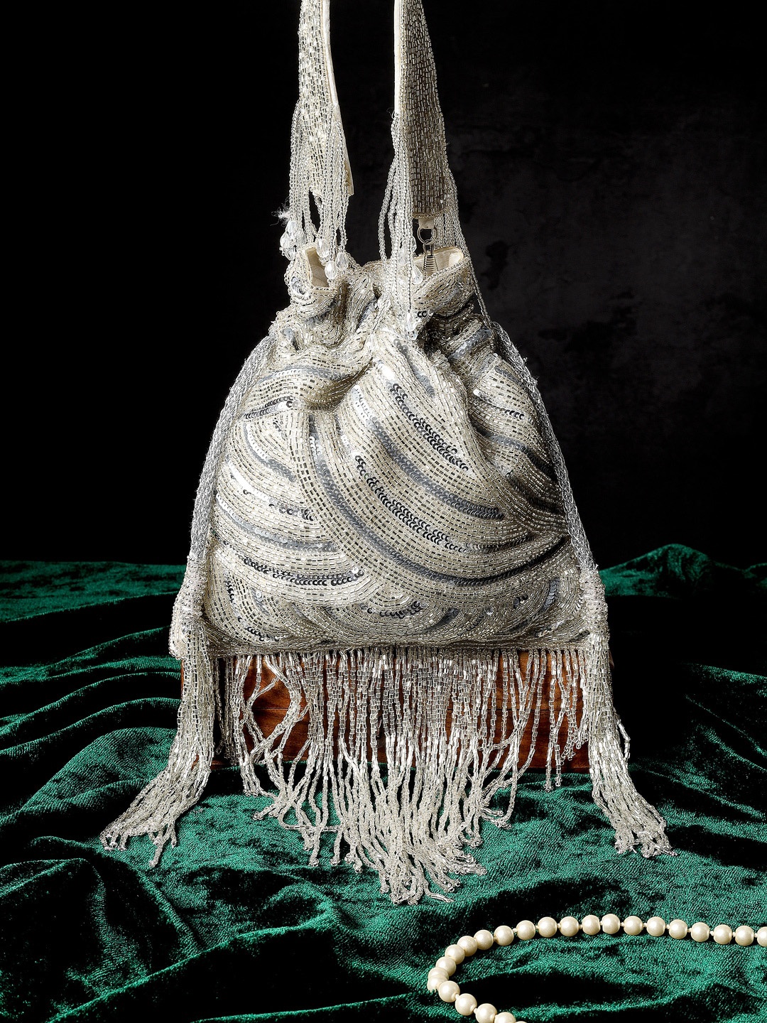 

A Clutch Story Wrist Loop Embroidered Potli Bag, Silver