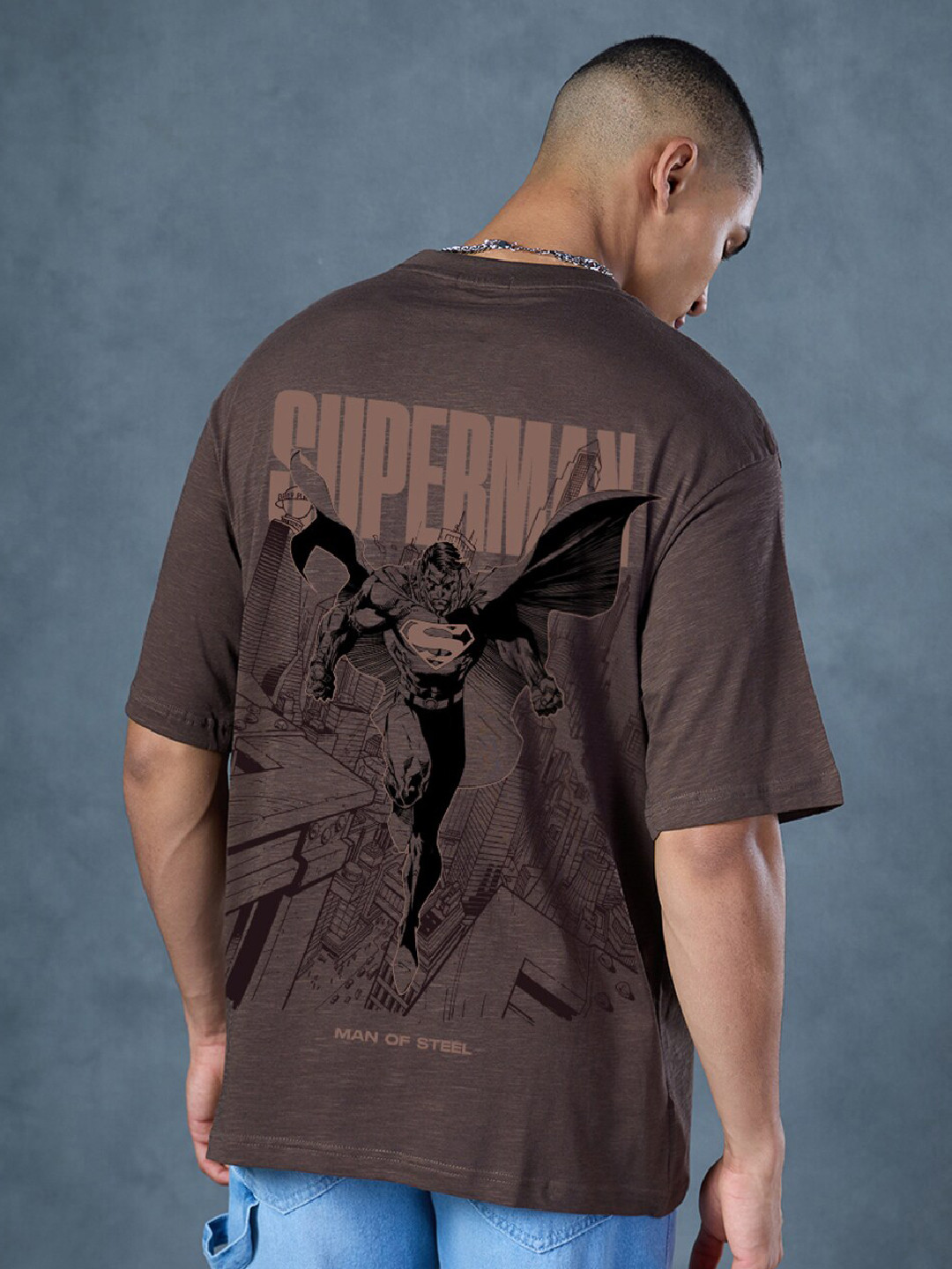 

Bewakoof AIR Superman Graphic Printed Round Neck Pure Cotton Oversized T-shirt, Brown