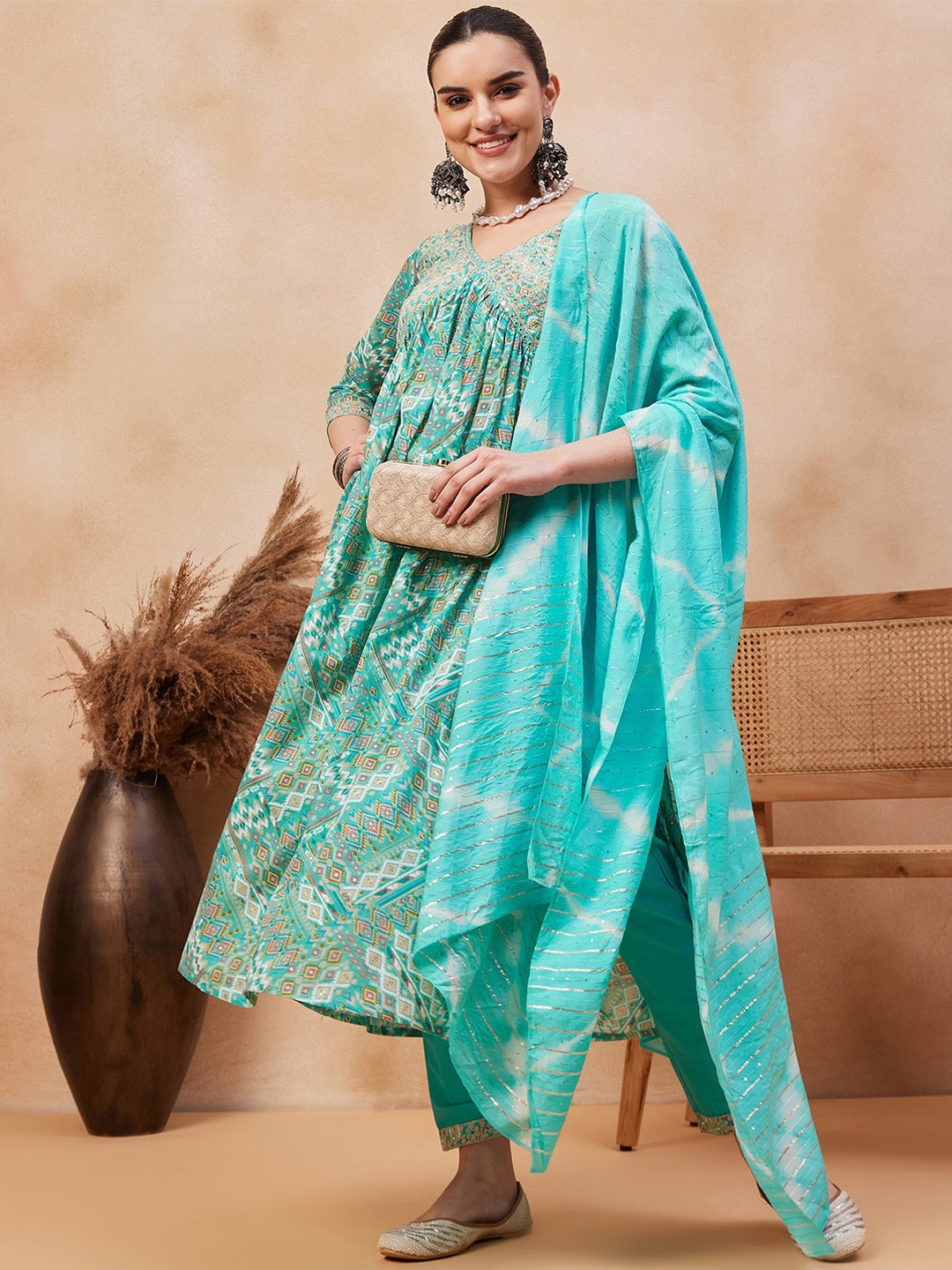 

Ishin V Neck Ethnic Motifs Embroidered Regular Thread Work Pure Cotton A-Line Kurta Set, Turquoise blue
