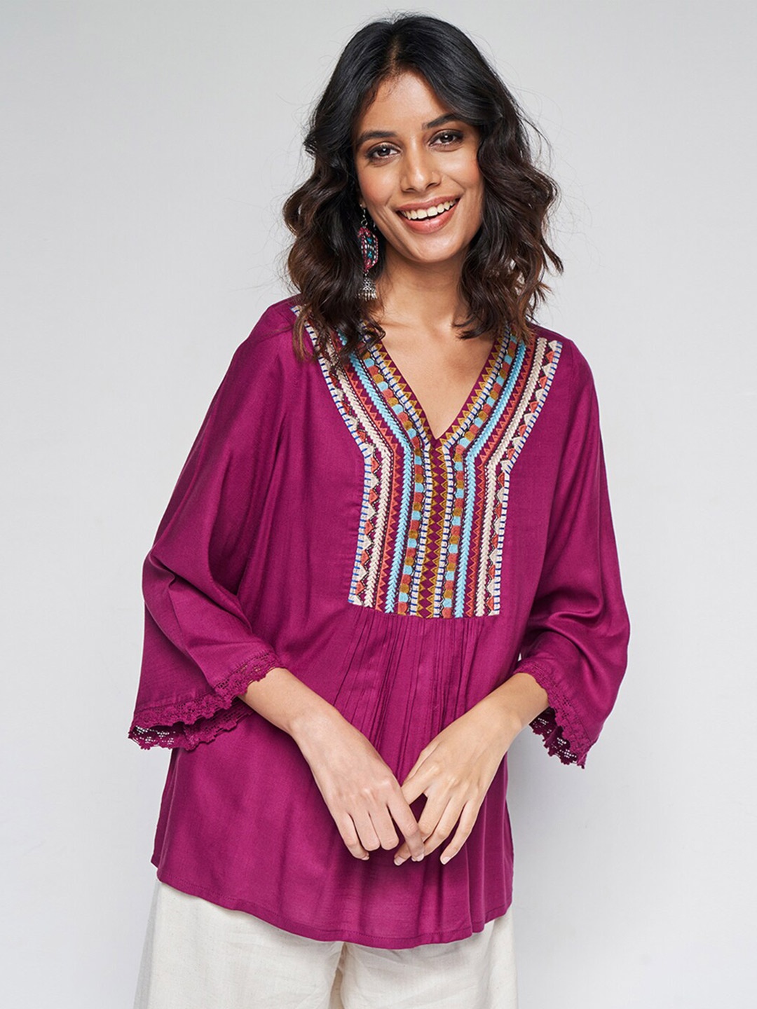

Global Desi Ethnic Motifs V-Neck Embellished Gathered or Pleated Top, Purple