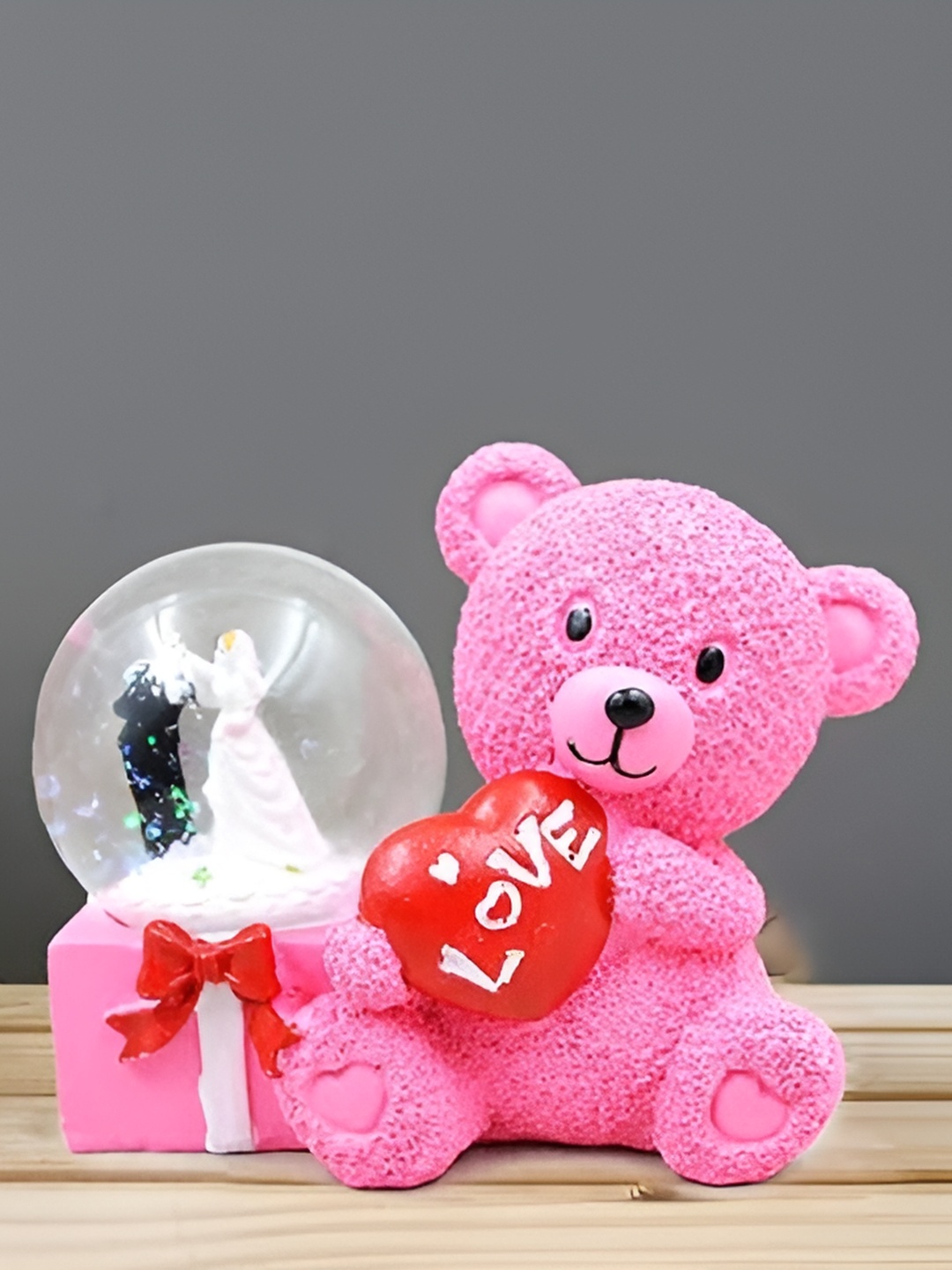 

Aura Pink Figurine Showpiece with Lighting
