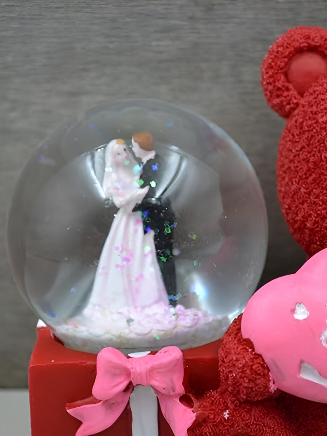 

Aura Red & Pink Figurine Showpiece