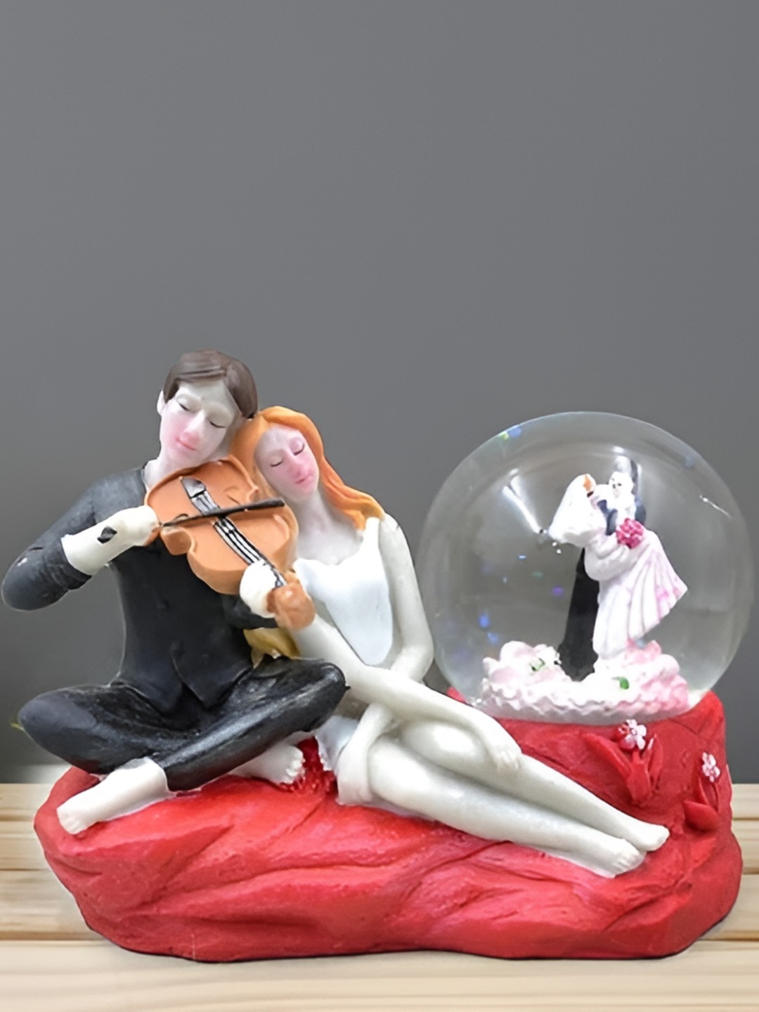 

Aura Red & White Figurine Showpiece