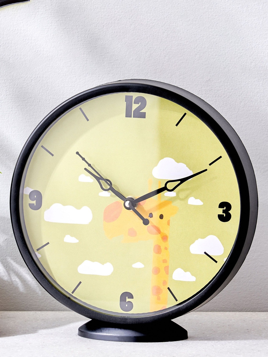 

Home Centre Yellow & Black Printed Analogue Contemporary Wall Clock