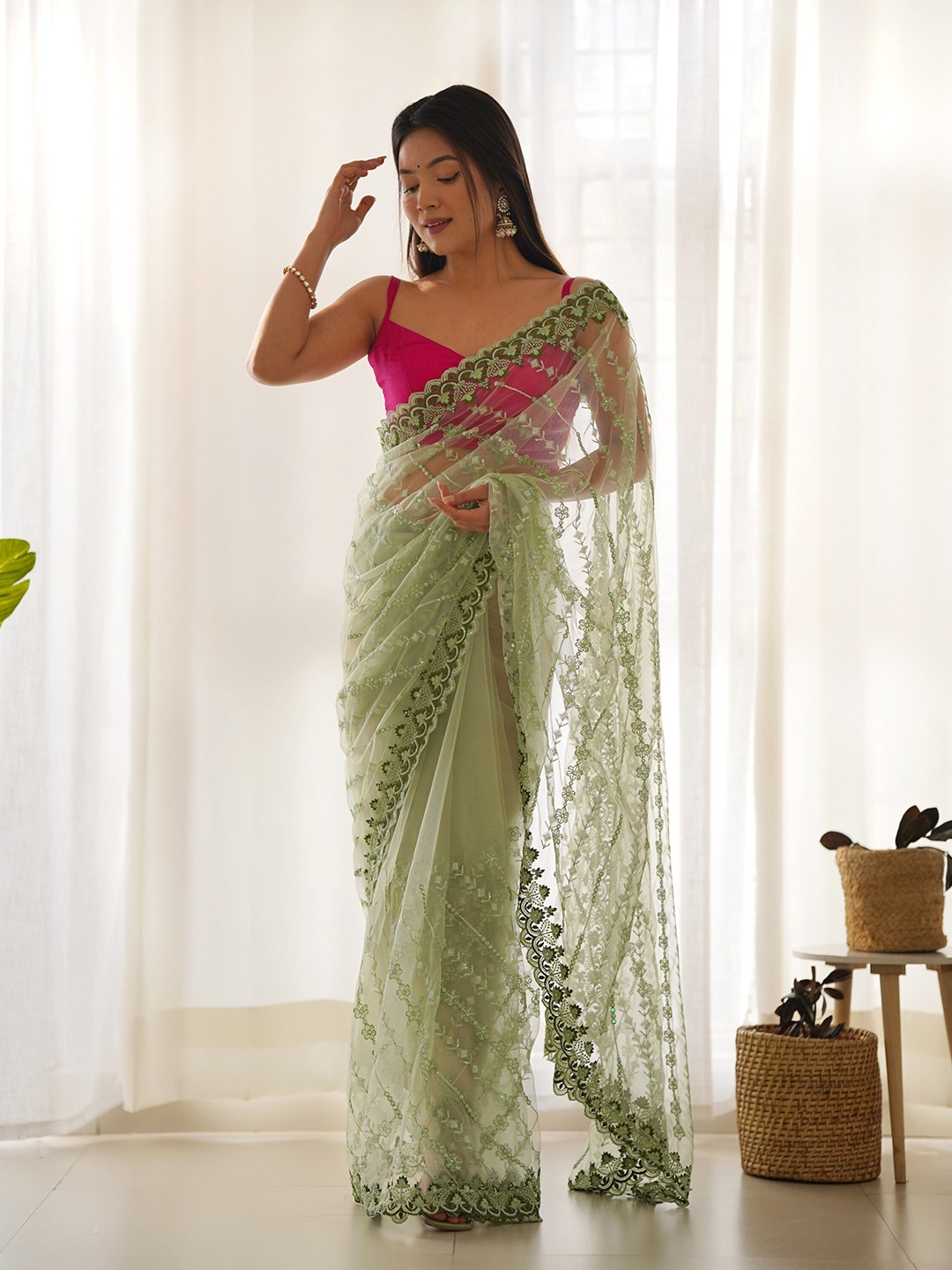 

RV CREATION Embellished Sequinned Net Saree, Green