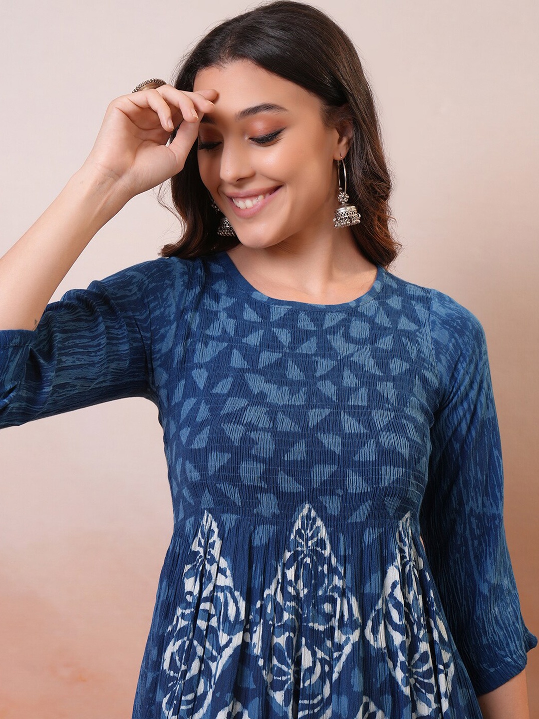 

Vishudh Blue & White Ethnic Motifs Printed Round Neck Smocked Pleated A-Line Midi Dress