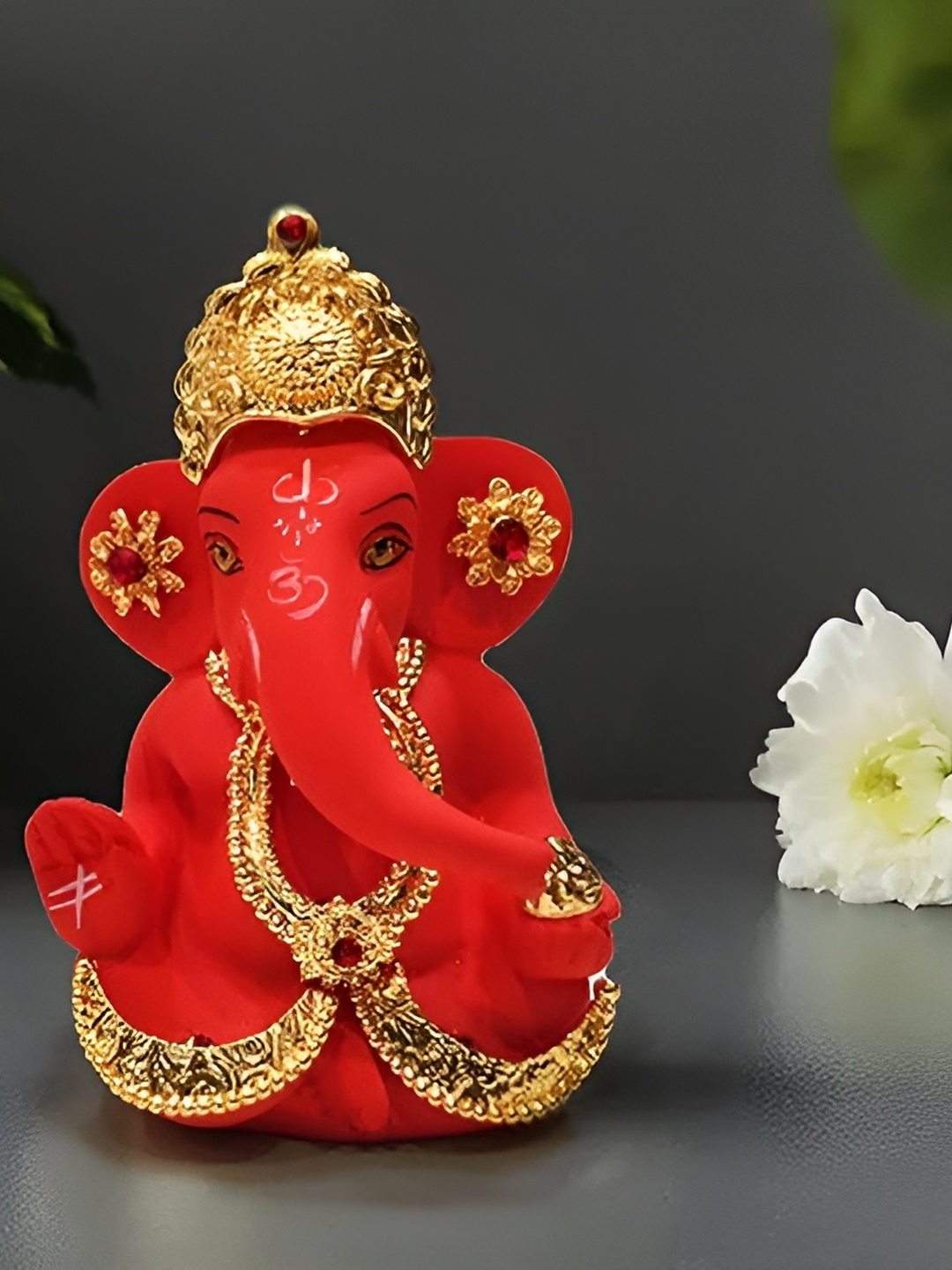 

Aura Orange & Gold Toned Religious Idol Showpiece