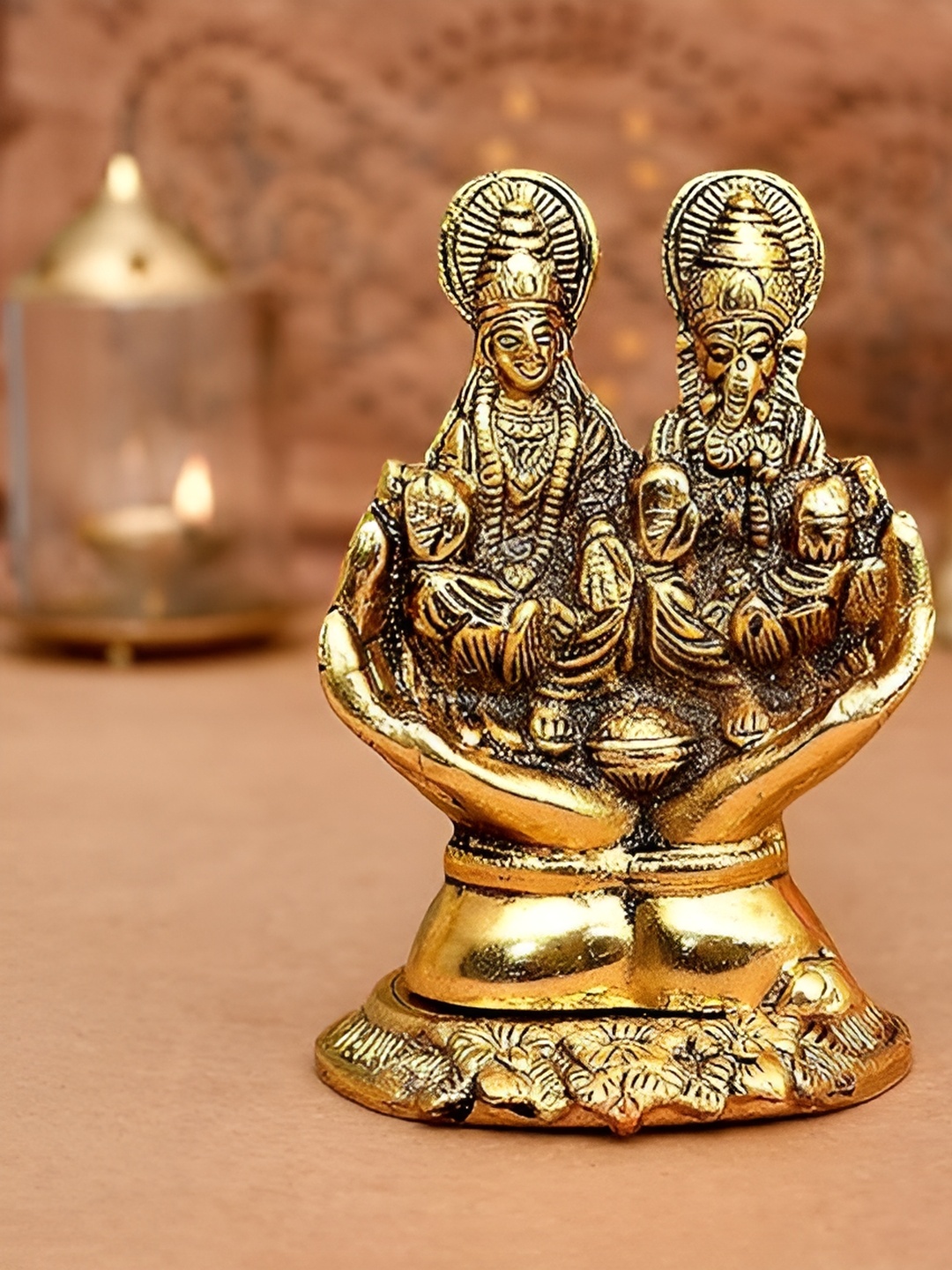 

Aura Gold-Toned Religious Palm Ganesha Lakshami Statue Idol Showpiece