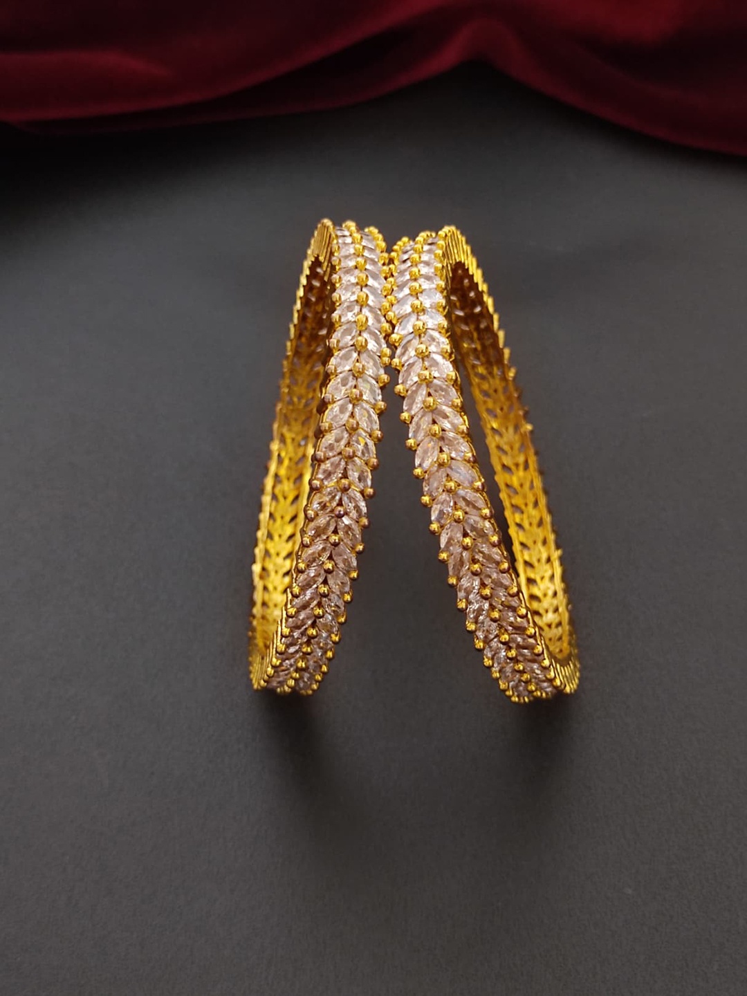 

Pihtara Jewels Set Of 2 Gold-Plated American Diamond Studded Bangles