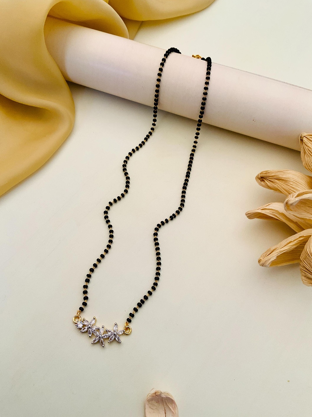 

Anouk Gold-Plated Stone-Studded and Beaded Mangalsutra