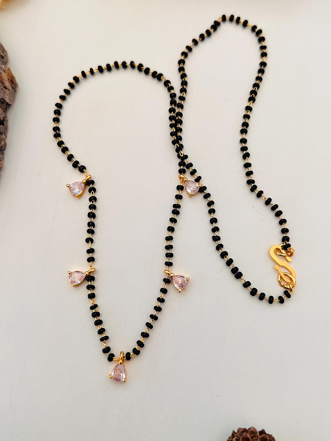 

Anouk Gold-Plated Stone-Studded and Beaded Mangalsutra