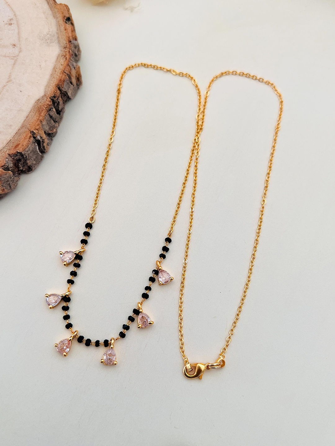 

Anouk Gold-Plated Stone-Studded and Beaded Mangalsutra