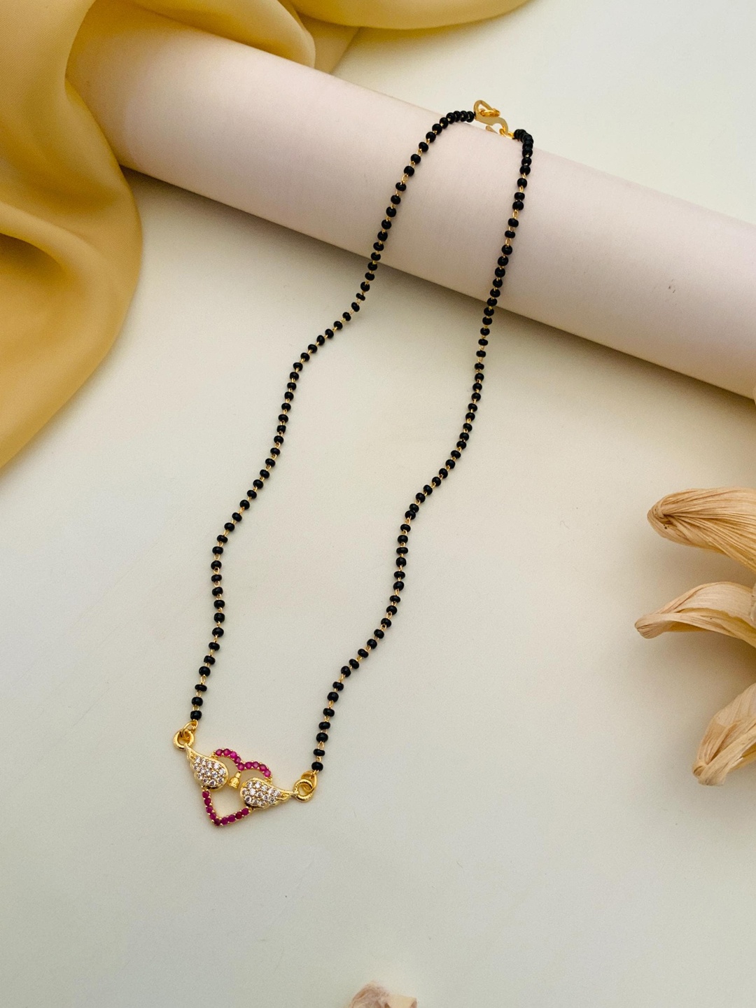 

Anouk Gold-Plated American Diamond-Studded and Beaded Mangalsutra