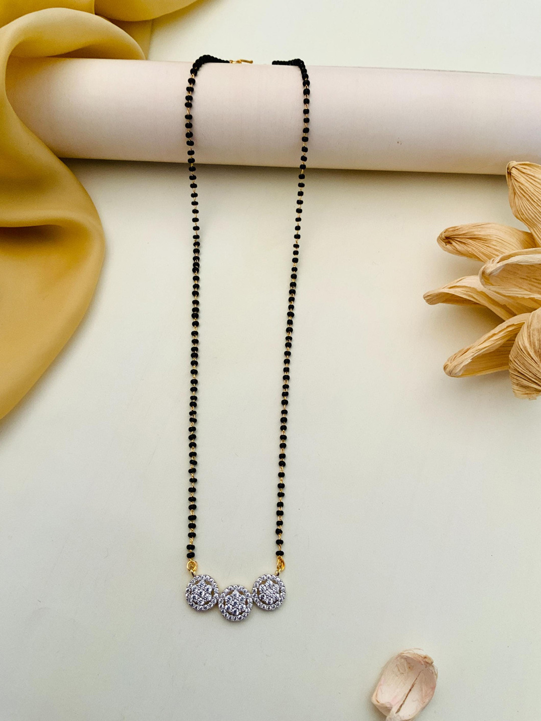 

Anouk Black Gold-Plated Stone Studded Mangalsutra