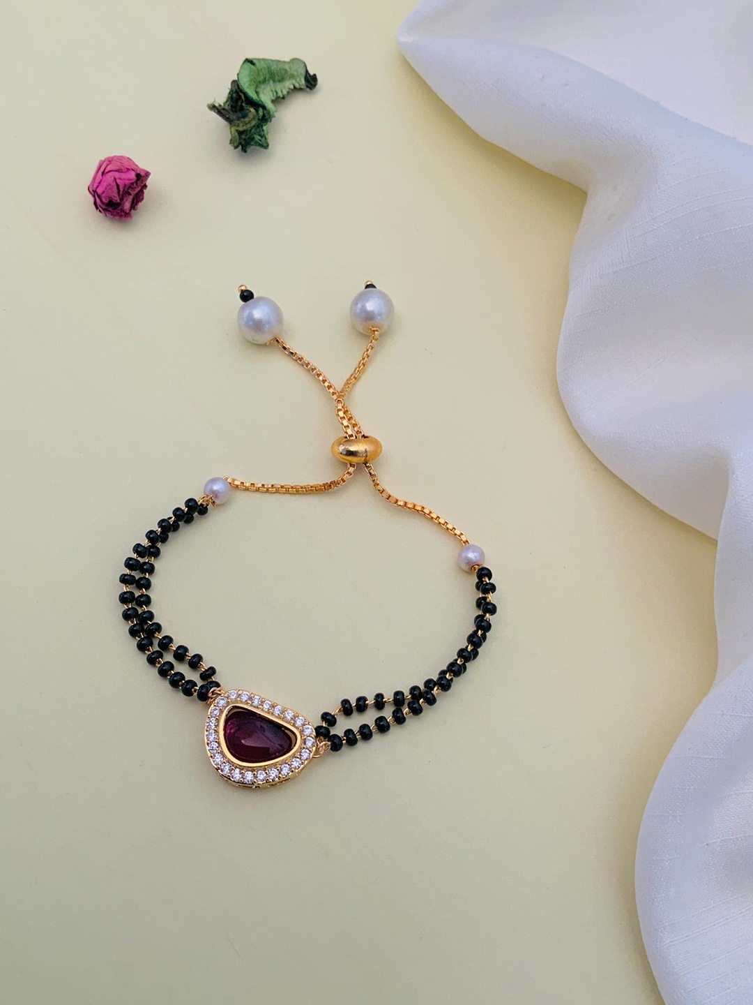 

Anouk Gold-Plated Stone Studded & Beaded Mangalsutra